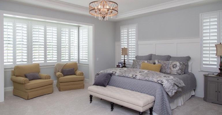 interior shutters offer subtle fashion. Plantation shutters in St. George bedroom.